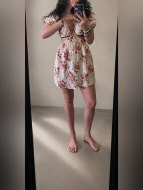 Olivaceous floral mini dress in size Small.